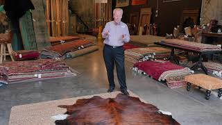 How to Layer Cowhide Rugs [upl. by Mccartan403]